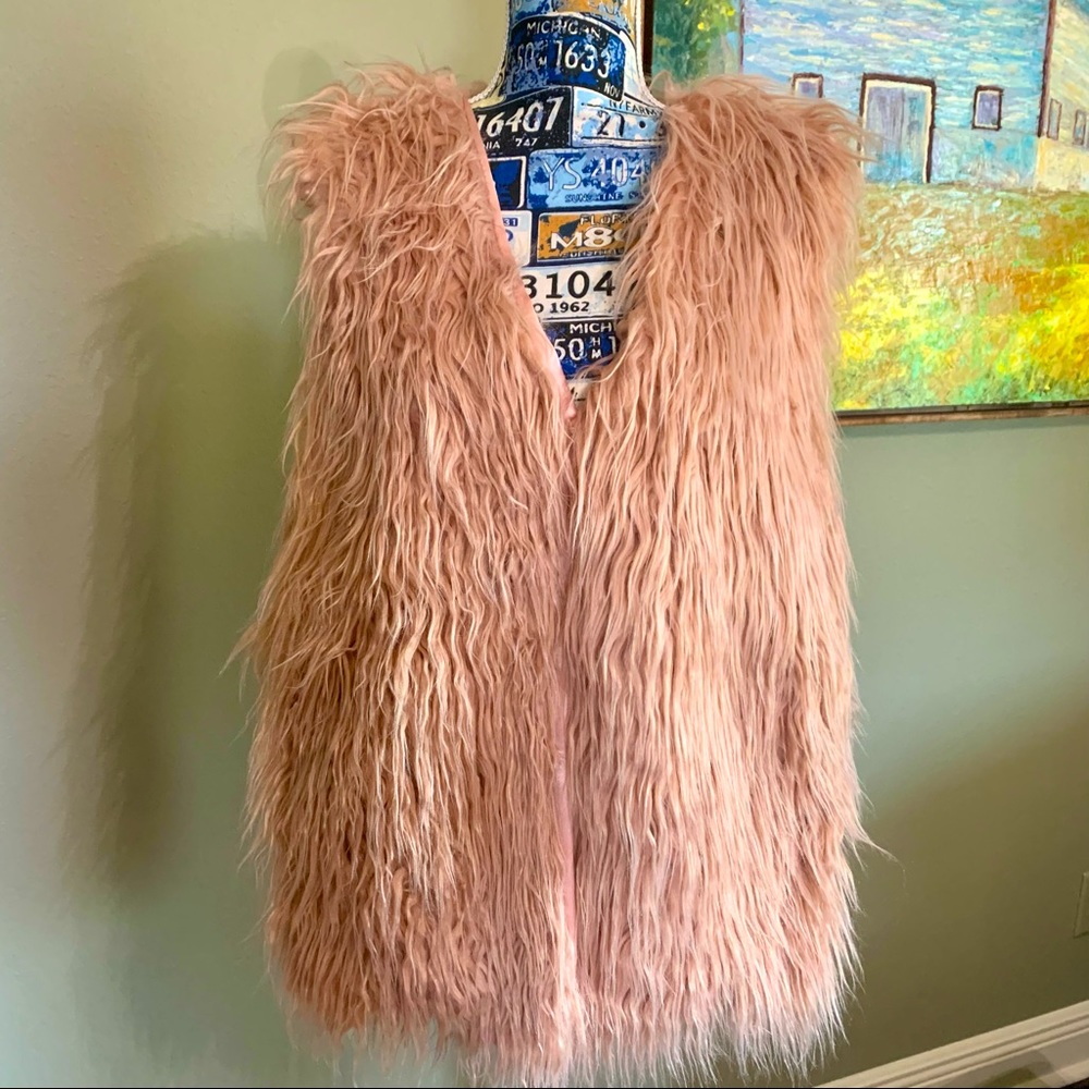 NWT beautiful fun pink shaggy faux fur vest. Well made. POCKETS! Satin lined.